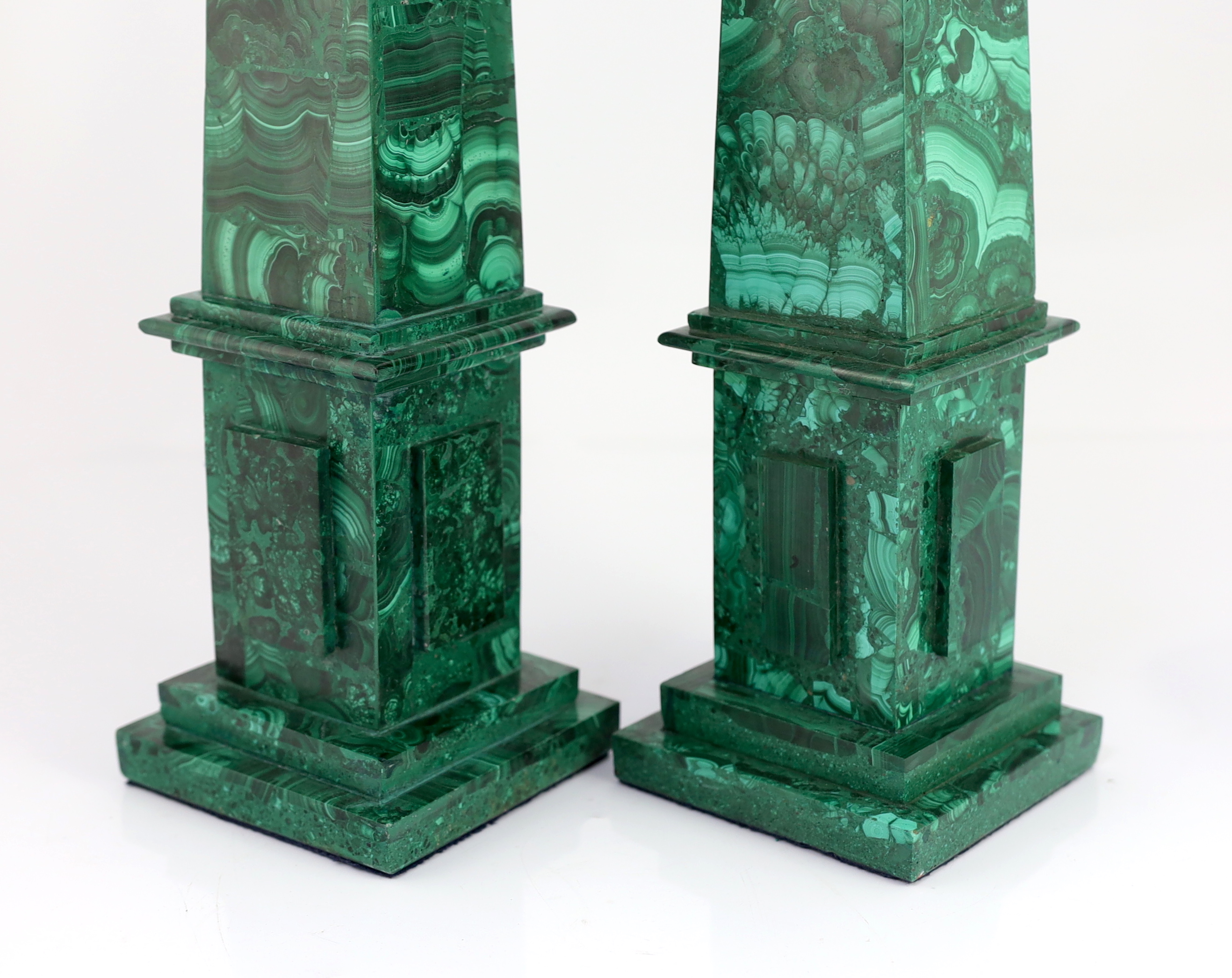 A pair of malachite veneered obelisks 12 x 12cm, 60cm high